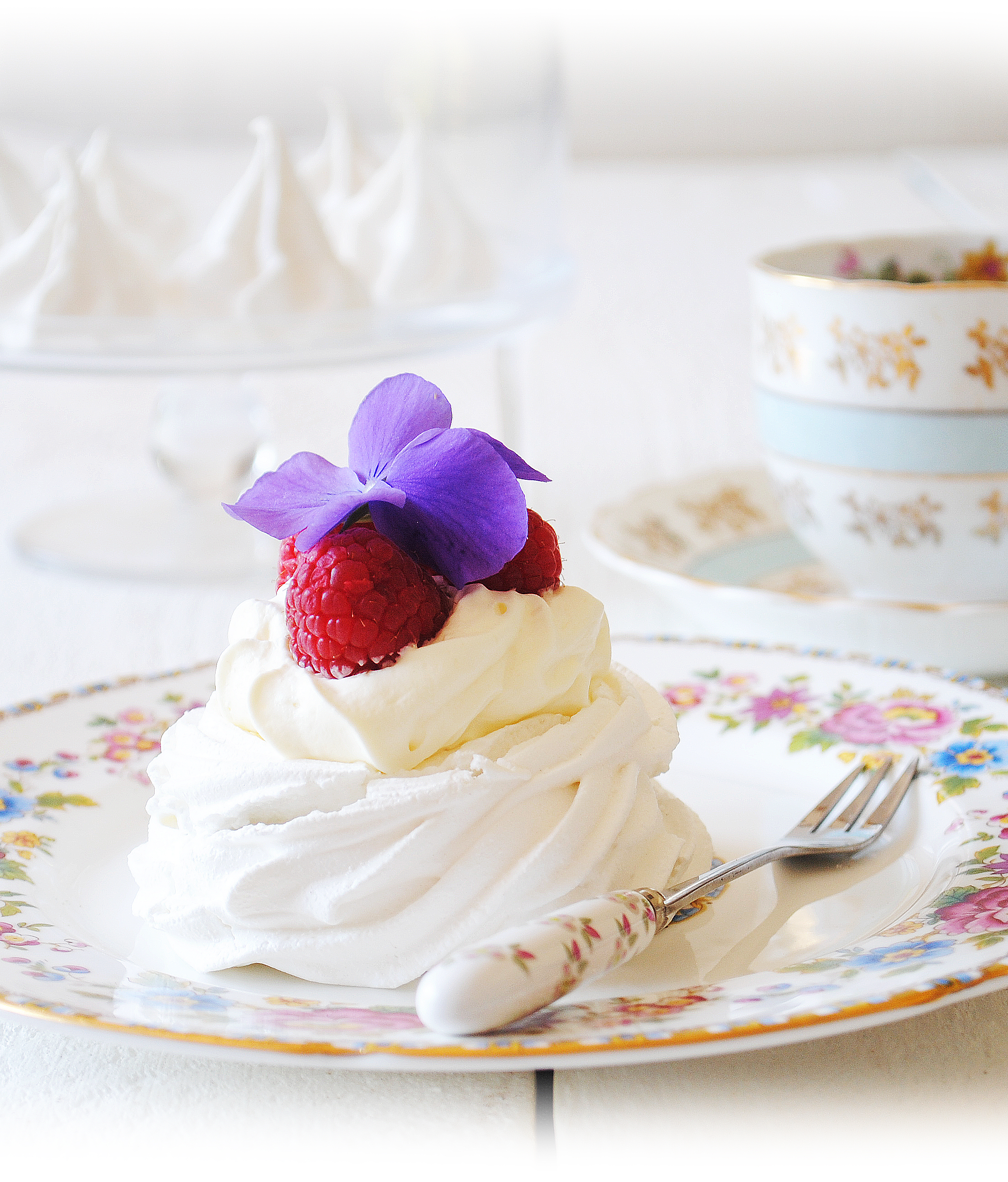 Raspberry Mini Pavlova with edible flowers